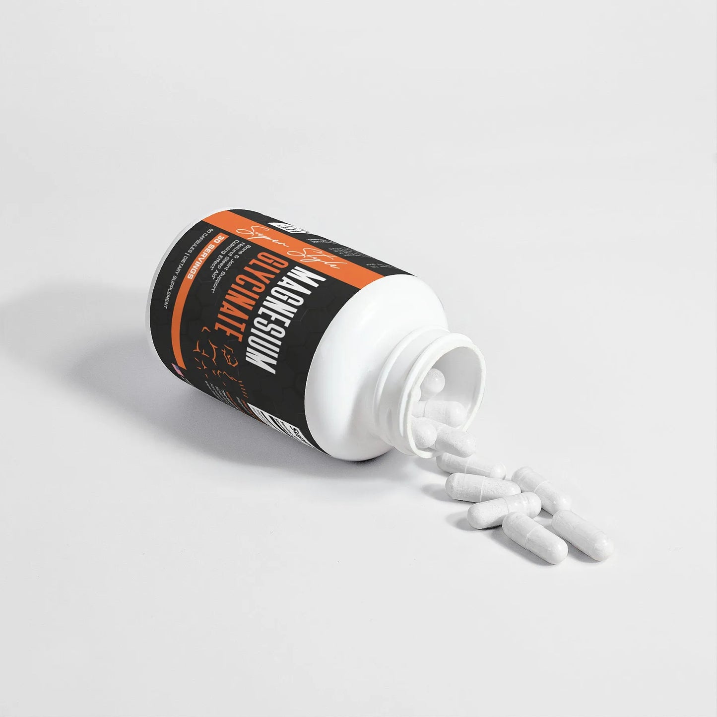 Magnesium Glycinate supplement bottle with capsules spilled out on white surface, showcasing Super Style packaging and product design