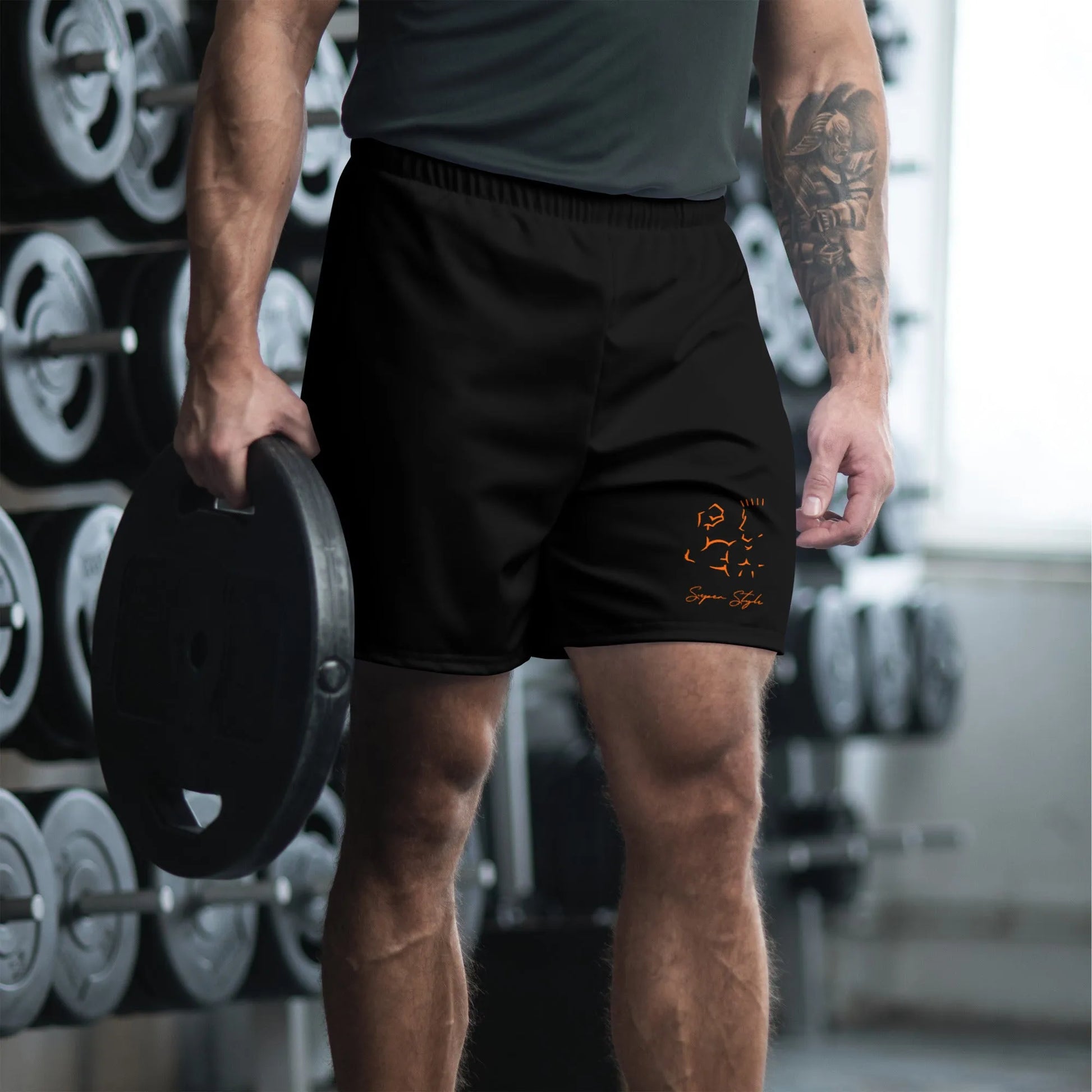 Male athlete wearing Super Style black shorts during weight training — side view.