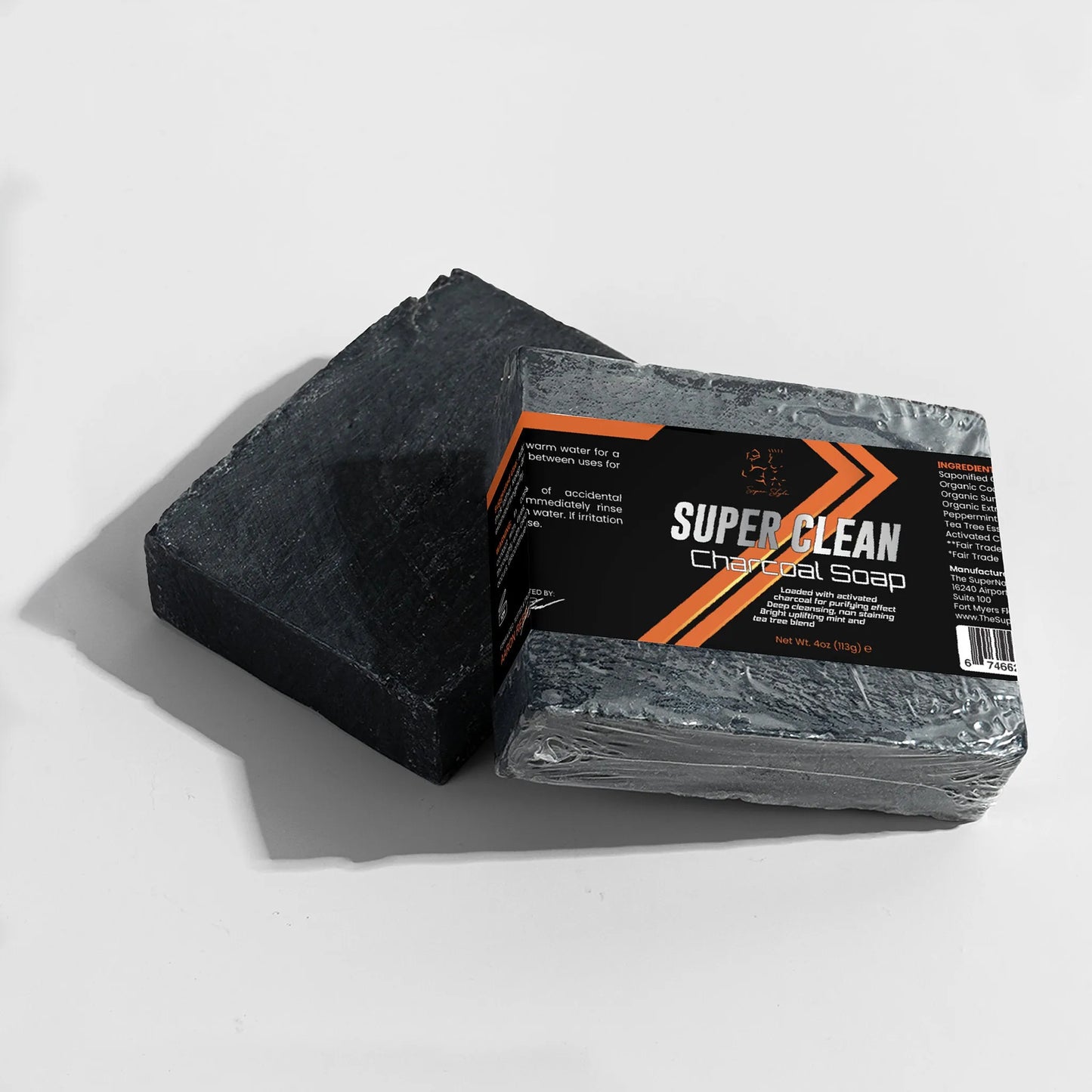 Two charcoal soap bars stacked with Super Style packaging