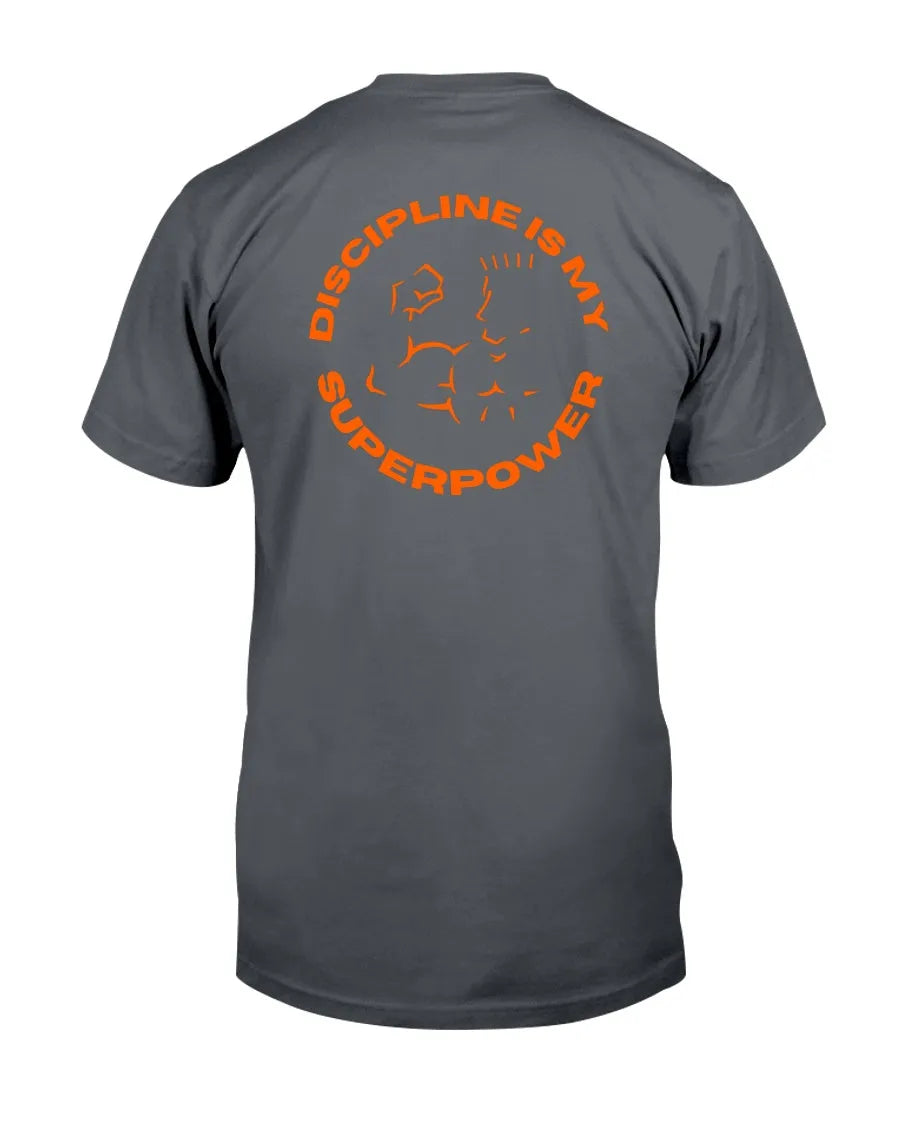 Back of dark gray tee with orange graphic.