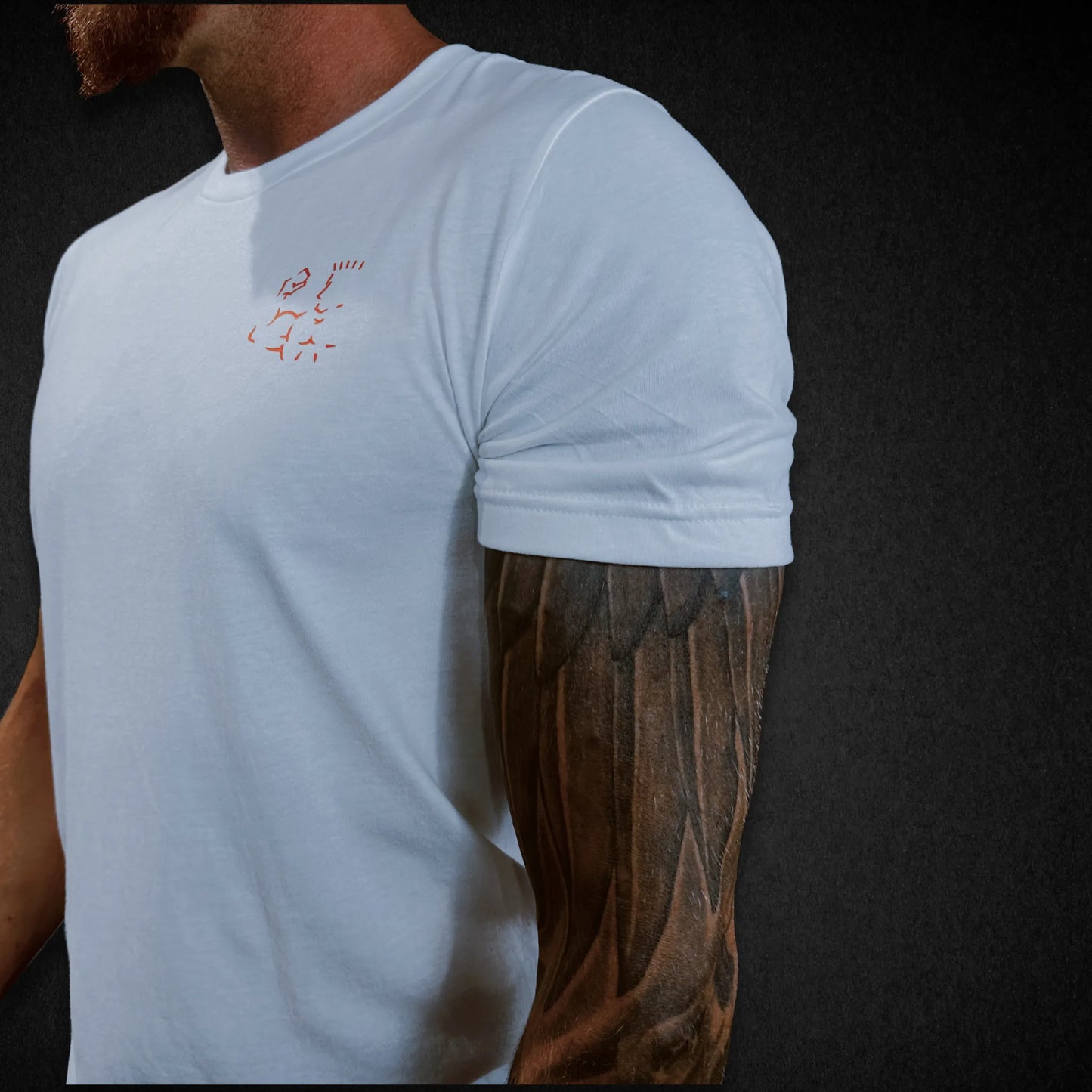Side angle view of Super Core Tee showing sleeve fit and logo
