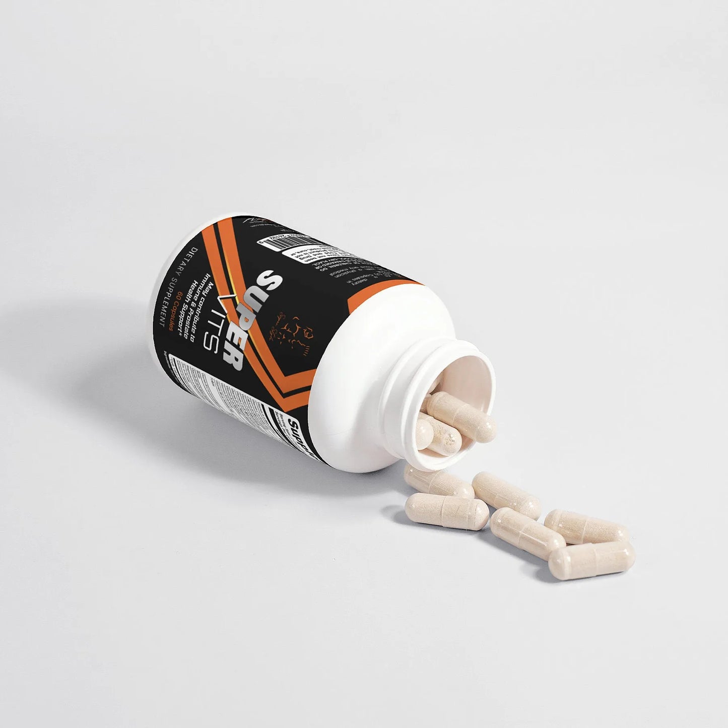 Super Style Super Vits supplement bottle tipped on its side with capsules spilling out, featuring black and orange label design emphasizing daily vitamin support and nutritional balance.