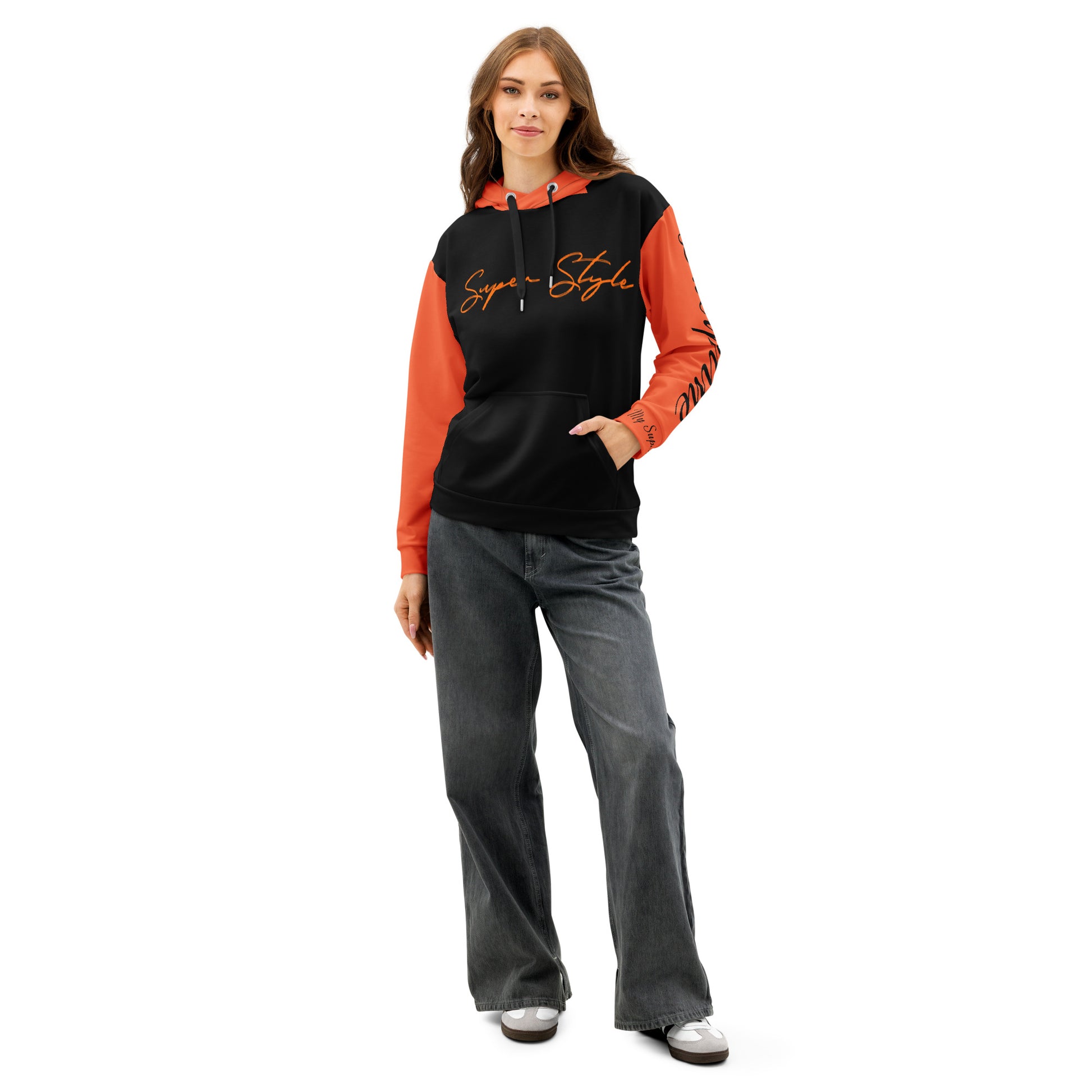 Person wearing a black and orange hoodie with text, gray pants, and white shoes on a white background