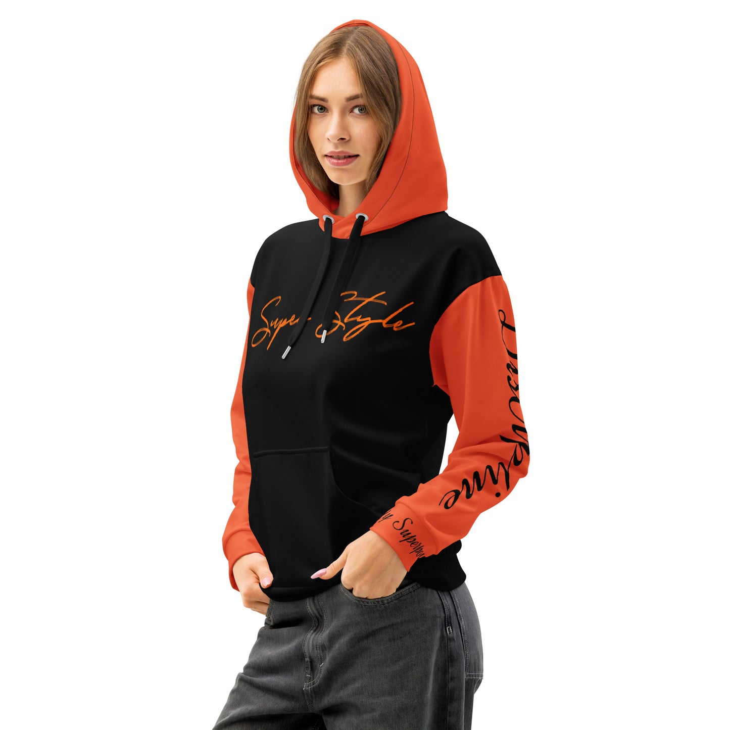 Person wearing a black and orange hoodie with text design on a white background